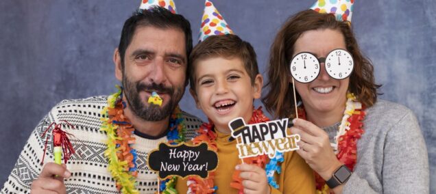 Happy family celebrating new years eve at home