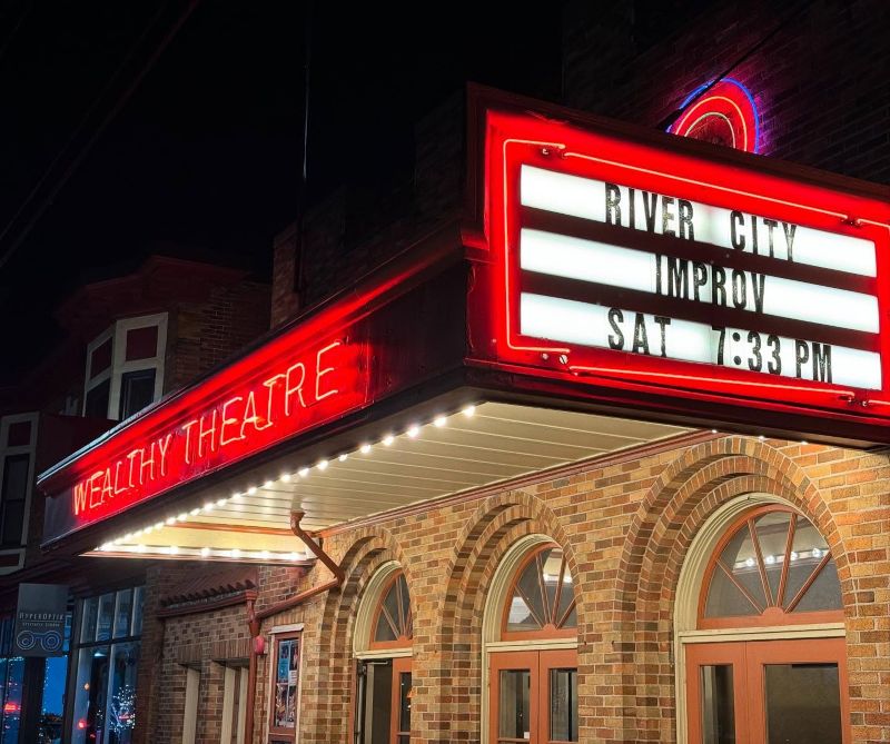 river city improv at wealthy theater sign - fb